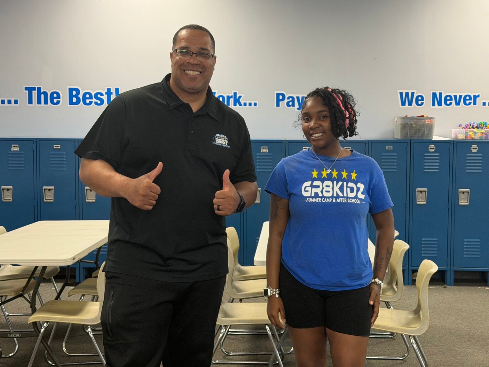 GR8 KIDZ owner Carlos Tearney poses for a photo next to one of his employees. Tearney founded GR8 KIDZ ten years ago. ©2026 Elliot Pototsky